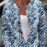 Ingrid | Chaqueta de punto azul y blanca con flores y pájaros
