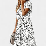 Rovena Vestido Midi de Lunares con Cuello Camisero y Cintura Ajustable