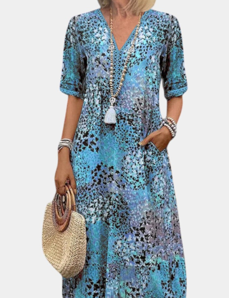 Perla Vestido Boho con Estampado Floral y Detalles en Crochet