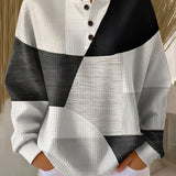 Christa | Suéter de patchwork en negro y blanco