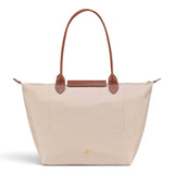 Bolso shopper plegable Claudia, crema, en uso