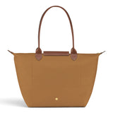 Bolso shopper plegable Carlota, marrón cognac, en uso