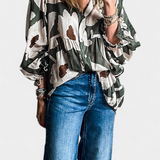 Filomena Blusa con Media Botonadura y Manga Abullonada en Estampado Floral Abstracto