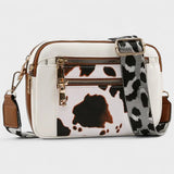 Olivia - Bolso bandolera con correa estampada