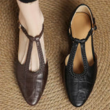 Greta – Zapatos clásicos de cuero con detalle trenzado
